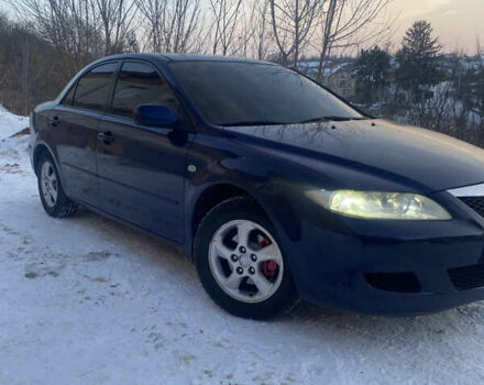 Синий Мазда 6, объемом двигателя 1.8 л и пробегом 321 тыс. км за 3950 $, фото 1 на Automoto.ua