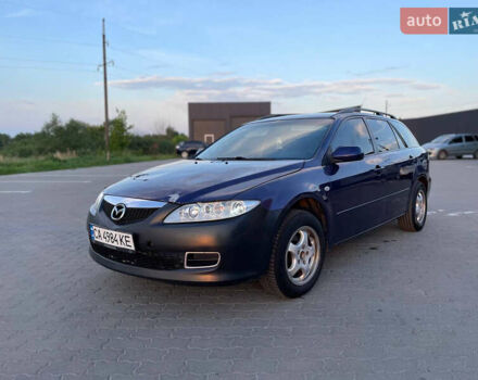 Синій Мазда 6, об'ємом двигуна 2 л та пробігом 243 тис. км за 2399 $, фото 1 на Automoto.ua