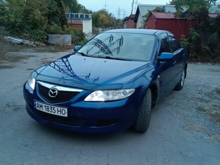 Синий Мазда 6, объемом двигателя 1.8 л и пробегом 320 тыс. км за 3100 $, фото 1 на Automoto.ua
