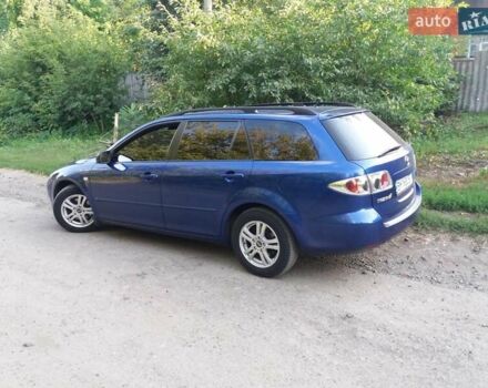 Синий Мазда 6, объемом двигателя 1.8 л и пробегом 226 тыс. км за 4400 $, фото 1 на Automoto.ua