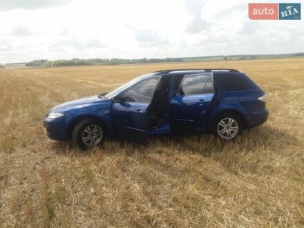 Синий Мазда 6, объемом двигателя 1.8 л и пробегом 226 тыс. км за 3900 $, фото 1 на Automoto.ua