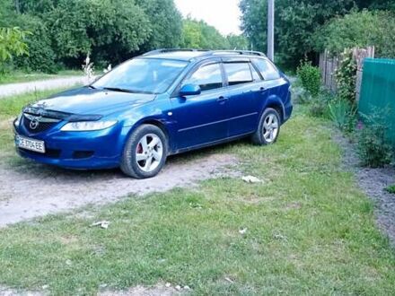 Синий Мазда 6, объемом двигателя 2 л и пробегом 245 тыс. км за 4200 $, фото 1 на Automoto.ua