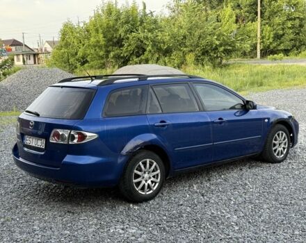 Синий Мазда 6, объемом двигателя 2 л и пробегом 257 тыс. км за 1350 $, фото 1 на Automoto.ua