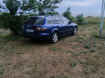 Синий Мазда 6, объемом двигателя 2 л и пробегом 220 тыс. км за 6400 $, фото 1 на Automoto.ua