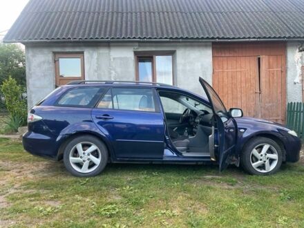 Синий Мазда 6, объемом двигателя 2 л и пробегом 274 тыс. км за 3150 $, фото 1 на Automoto.ua