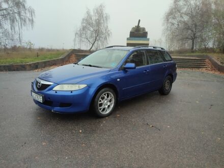 Синий Мазда 6, объемом двигателя 2 л и пробегом 220 тыс. км за 1200 $, фото 1 на Automoto.ua