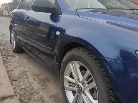 Синий Мазда 6, объемом двигателя 2 л и пробегом 244 тыс. км за 5200 $, фото 1 на Automoto.ua