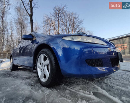 Синій Мазда 6, об'ємом двигуна 2 л та пробігом 317 тис. км за 3400 $, фото 1 на Automoto.ua