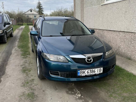 Синий Мазда 6, объемом двигателя 2 л и пробегом 310 тыс. км за 4200 $, фото 1 на Automoto.ua