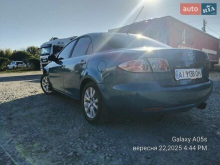 Синий Мазда 6, объемом двигателя 2 л и пробегом 385 тыс. км за 4500 $, фото 1 на Automoto.ua