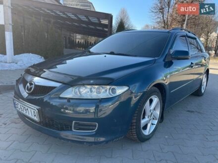 Синій Мазда 6, об'ємом двигуна 2 л та пробігом 252 тис. км за 3400 $, фото 1 на Automoto.ua