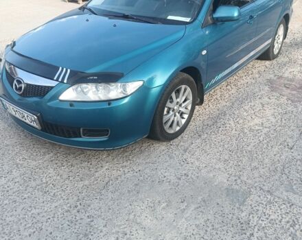 Синий Мазда 6, объемом двигателя 2 л и пробегом 381 тыс. км за 3900 $, фото 1 на Automoto.ua