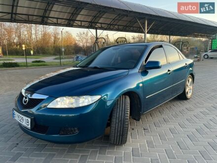 Синий Мазда 6, объемом двигателя 2 л и пробегом 225 тыс. км за 6500 $, фото 1 на Automoto.ua