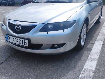Синий Мазда 6, объемом двигателя 2 л и пробегом 300 тыс. км за 5500 $, фото 1 на Automoto.ua