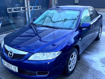 Синий Мазда 6, объемом двигателя 2 л и пробегом 237 тыс. км за 3750 $, фото 1 на Automoto.ua