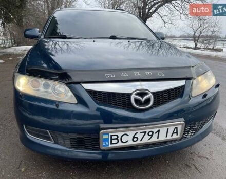 Синий Мазда 6, объемом двигателя 2 л и пробегом 252 тыс. км за 3600 $, фото 1 на Automoto.ua