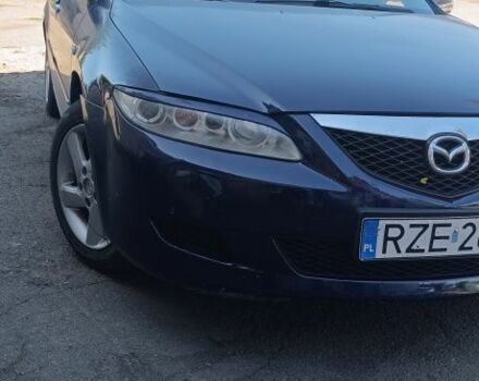 Синій Мазда 6, об'ємом двигуна 2 л та пробігом 295 тис. км за 1750 $, фото 1 на Automoto.ua