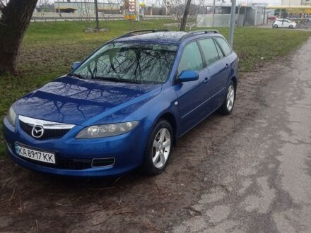 Синий Мазда 6, объемом двигателя 1.8 л и пробегом 245 тыс. км за 4200 $, фото 1 на Automoto.ua