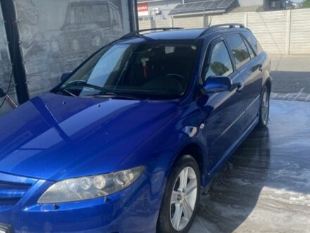 Синий Мазда 6, объемом двигателя 2 л и пробегом 260 тыс. км за 4000 $, фото 1 на Automoto.ua
