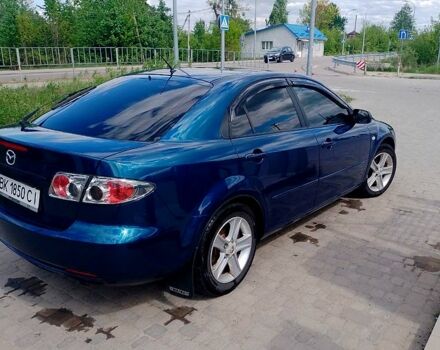 Синий Мазда 6, объемом двигателя 2 л и пробегом 234 тыс. км за 4300 $, фото 1 на Automoto.ua