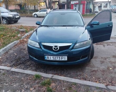 Синій Мазда 6, об'ємом двигуна 2 л та пробігом 240 тис. км за 3700 $, фото 1 на Automoto.ua