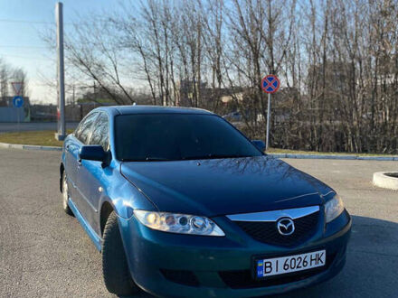 Синий Мазда 6, объемом двигателя 2 л и пробегом 250 тыс. км за 4200 $, фото 1 на Automoto.ua