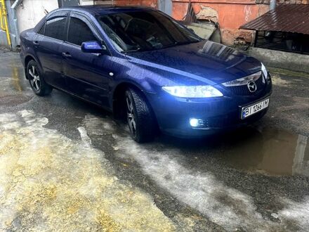 Синий Мазда 6, объемом двигателя 2 л и пробегом 320 тыс. км за 3650 $, фото 1 на Automoto.ua