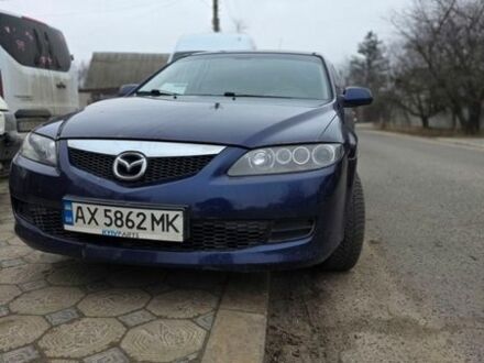 Синий Мазда 6, объемом двигателя 1.8 л и пробегом 205 тыс. км за 5200 $, фото 1 на Automoto.ua