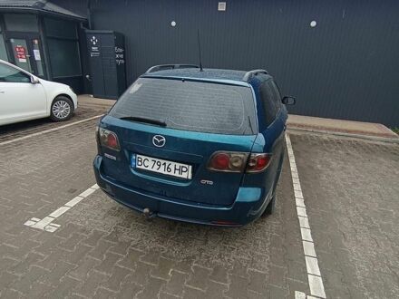 Синий Мазда 6, объемом двигателя 2 л и пробегом 286 тыс. км за 3900 $, фото 1 на Automoto.ua