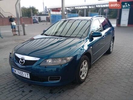 Синий Мазда 6, объемом двигателя 2 л и пробегом 239 тыс. км за 4800 $, фото 1 на Automoto.ua