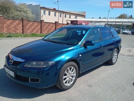 Синий Мазда 6, объемом двигателя 2 л и пробегом 239 тыс. км за 4800 $, фото 1 на Automoto.ua