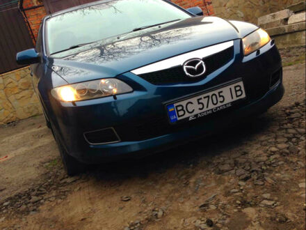Синий Мазда 6, объемом двигателя 2 л и пробегом 240 тыс. км за 6000 $, фото 1 на Automoto.ua