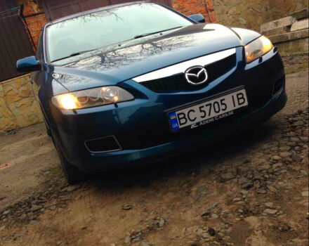 Синий Мазда 6, объемом двигателя 2 л и пробегом 240 тыс. км за 6000 $, фото 1 на Automoto.ua