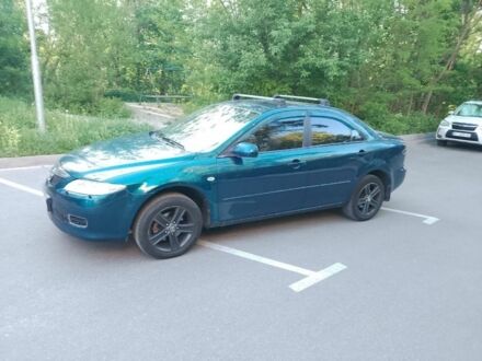 Синий Мазда 6, объемом двигателя 2 л и пробегом 270 тыс. км за 4000 $, фото 1 на Automoto.ua