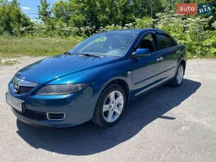 Синий Мазда 6, объемом двигателя 1.8 л и пробегом 240 тыс. км за 5200 $, фото 1 на Automoto.ua
