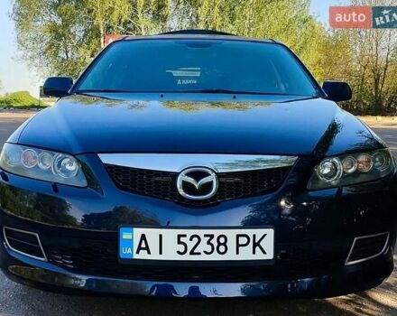 Синий Мазда 6, объемом двигателя 2 л и пробегом 245 тыс. км за 5300 $, фото 1 на Automoto.ua