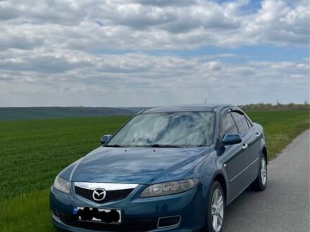 Синий Мазда 6, объемом двигателя 1.8 л и пробегом 250 тыс. км за 4444 $, фото 1 на Automoto.ua