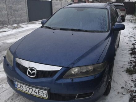 Синий Мазда 6, объемом двигателя 2 л и пробегом 243 тыс. км за 5600 $, фото 1 на Automoto.ua