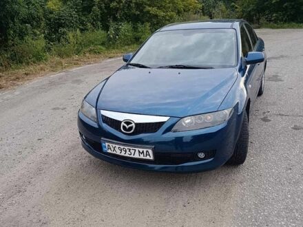 Синий Мазда 6, объемом двигателя 2 л и пробегом 261 тыс. км за 5100 $, фото 1 на Automoto.ua