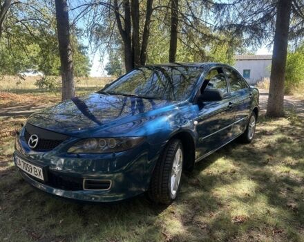 Синий Мазда 6, объемом двигателя 2 л и пробегом 202 тыс. км за 4200 $, фото 1 на Automoto.ua