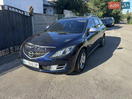 Синий Мазда 6, объемом двигателя 2 л и пробегом 270 тыс. км за 6900 $, фото 1 на Automoto.ua