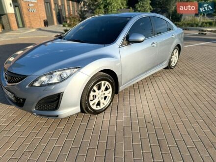 Синий Мазда 6, объемом двигателя 1.8 л и пробегом 259 тыс. км за 6300 $, фото 1 на Automoto.ua