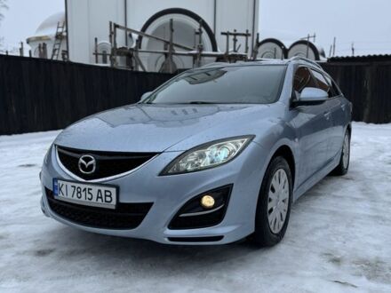 Синий Мазда 6, объемом двигателя 2 л и пробегом 256 тыс. км за 8500 $, фото 1 на Automoto.ua