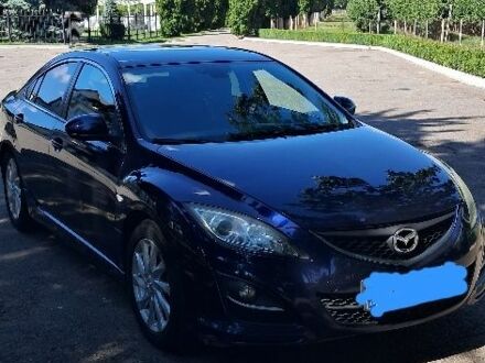 Синий Мазда 6, объемом двигателя 2 л и пробегом 253 тыс. км за 6700 $, фото 1 на Automoto.ua