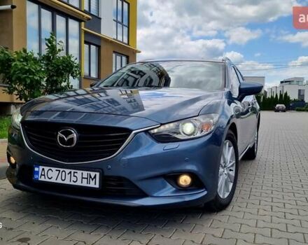 Синій Мазда 6, об'ємом двигуна 2.18 л та пробігом 243 тис. км за 10600 $, фото 1 на Automoto.ua