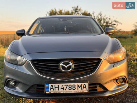 Синий Мазда 6, объемом двигателя 2 л и пробегом 170 тыс. км за 9800 $, фото 1 на Automoto.ua