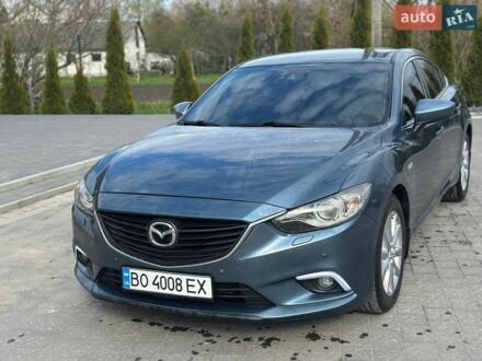 Синий Мазда 6, объемом двигателя 2.2 л и пробегом 232 тыс. км за 9900 $, фото 1 на Automoto.ua