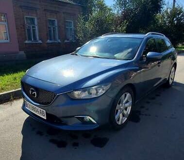 Синій Мазда 6, об'ємом двигуна 2.18 л та пробігом 256 тис. км за 9700 $, фото 1 на Automoto.ua