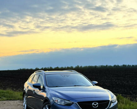 Синий Мазда 6, объемом двигателя 2.19 л и пробегом 251 тыс. км за 11500 $, фото 1 на Automoto.ua