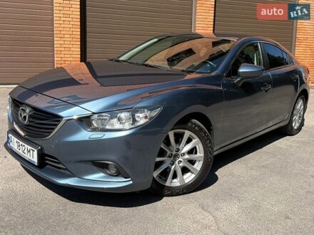 Синій Мазда 6, об'ємом двигуна 2 л та пробігом 215 тис. км за 11399 $, фото 1 на Automoto.ua